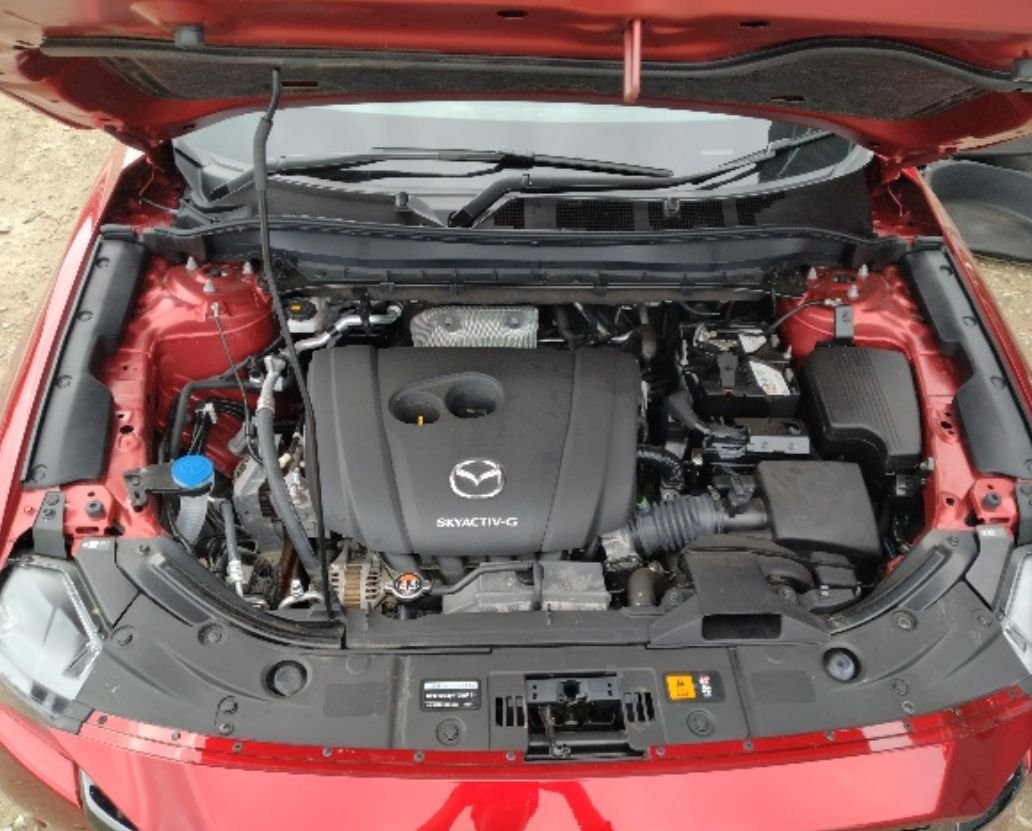 Engine bay of the 2.0 L Skyactiv-G engine