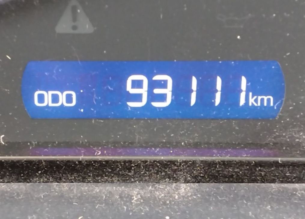 Odometer showing 93,111 km