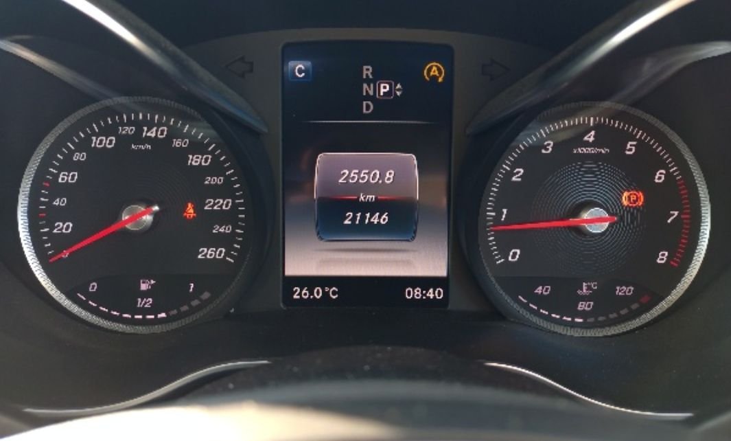 Instrument cluster showing 21,146 km
