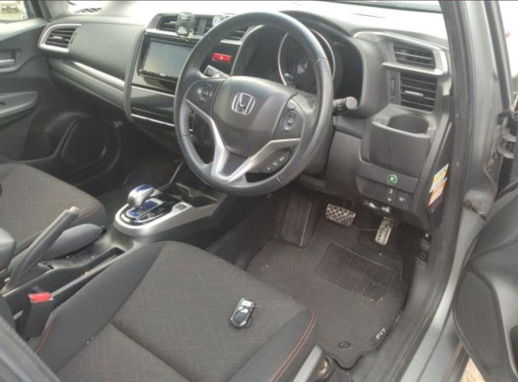 Right-hand-drive interior with sport seats and navigation