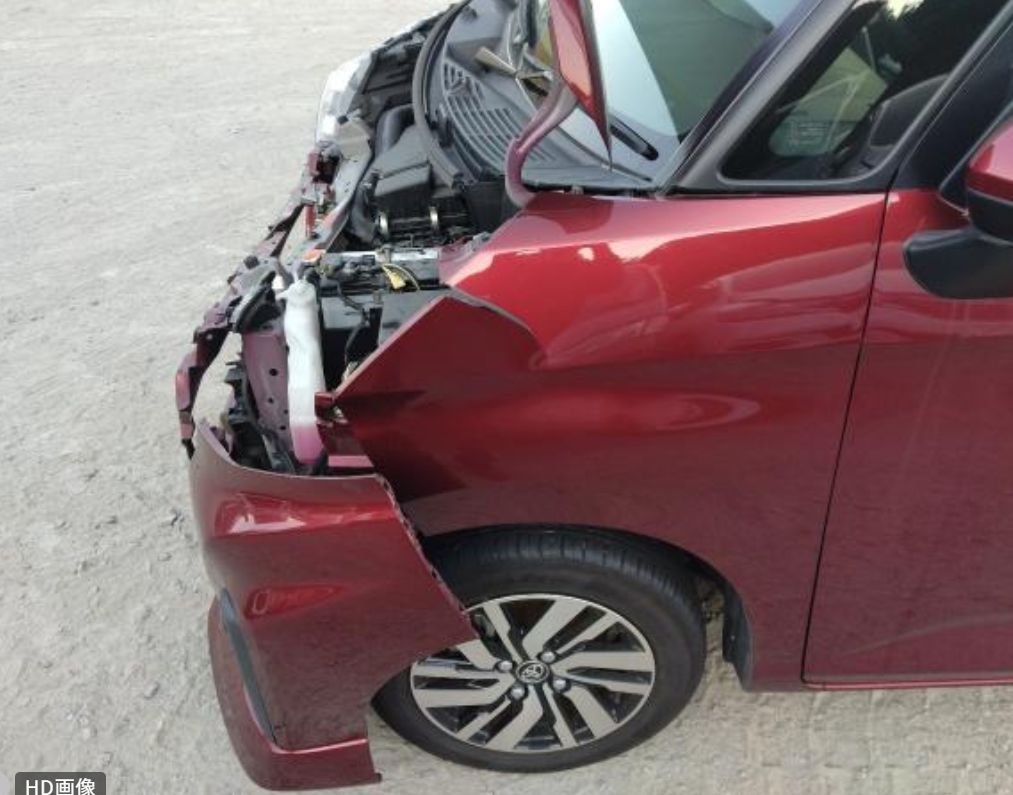 Front left of the Toyota Roomy with the bumper pulled off