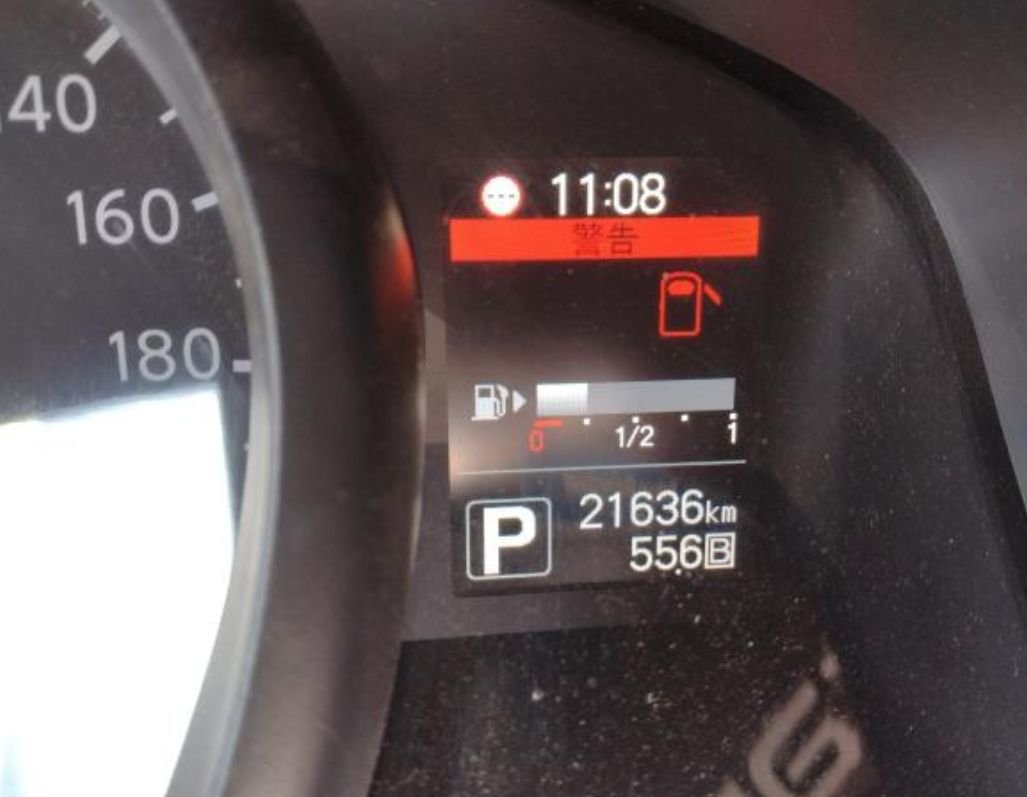 Instrument display showing 21,636 km