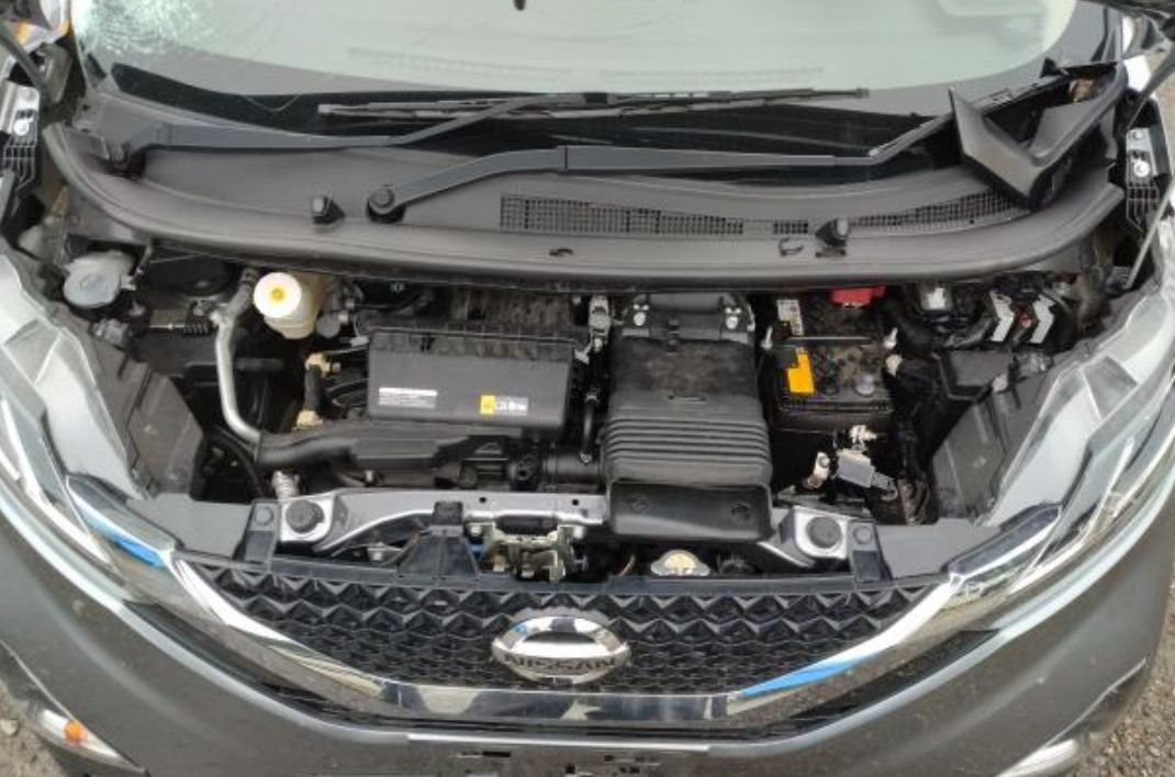 Engine bay of the 660 cc turbo hybrid