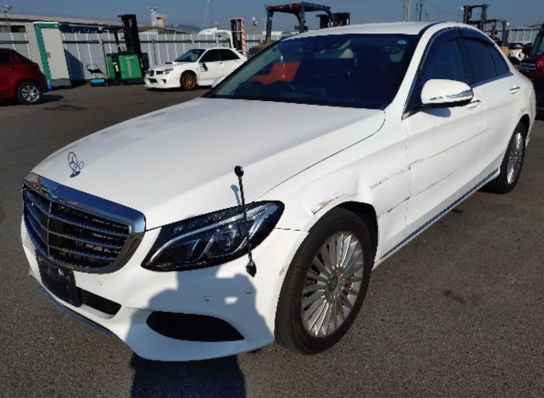 Front left of the C200 showing side-swipe scrapes along the left side