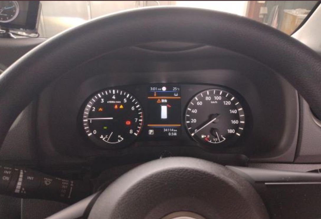 Instrument cluster showing 34,114 km