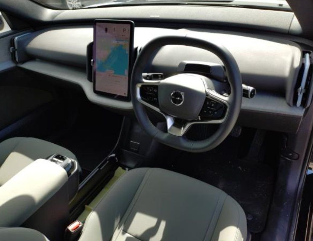Right-hand-drive cabin with central touchscreen