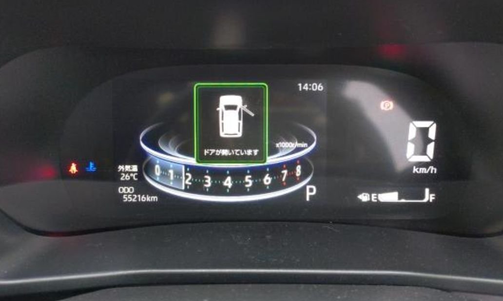 Digital instrument cluster showing 55,216 km