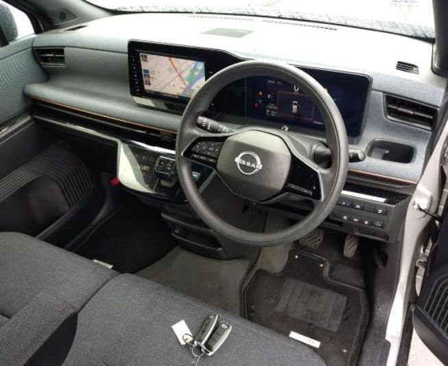 Right-hand-drive dashboard with navigation screen