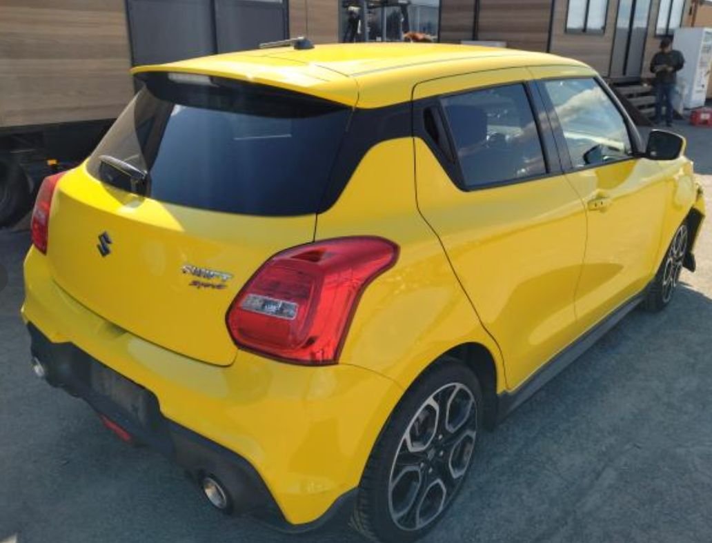 Rear left of the Swift Sport with the twin exhaust