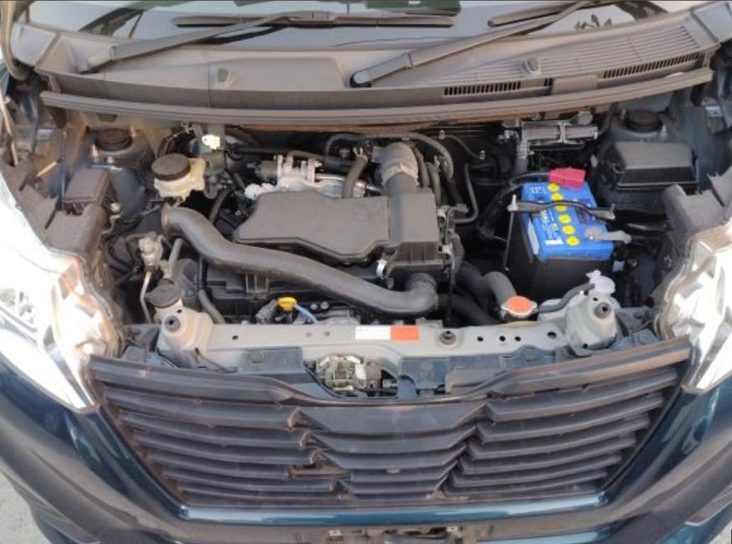 Engine bay of the Subaru Justy